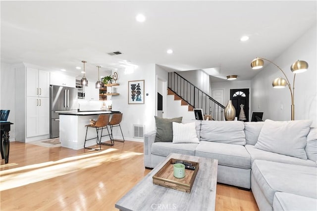 living room with light wood-type flooring