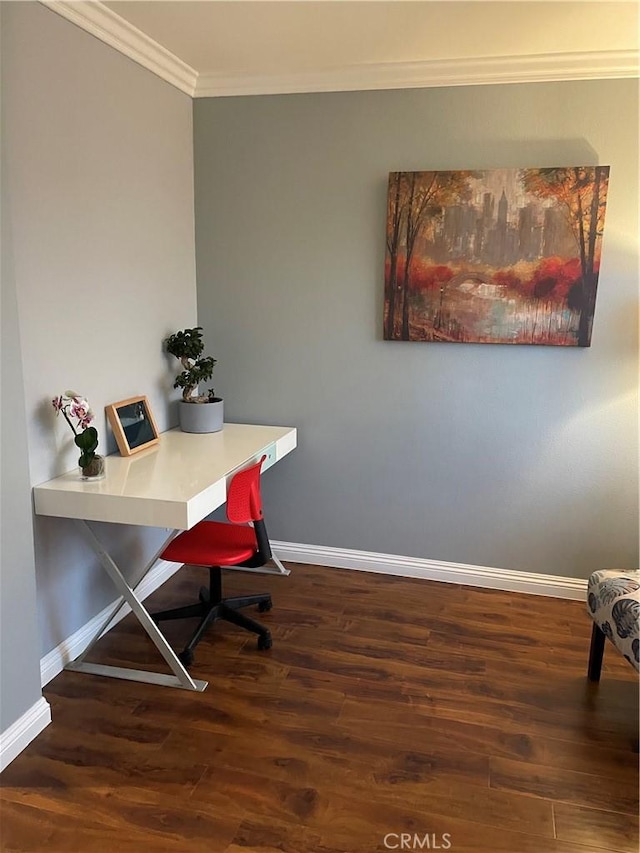 office space with crown molding and dark wood-type flooring