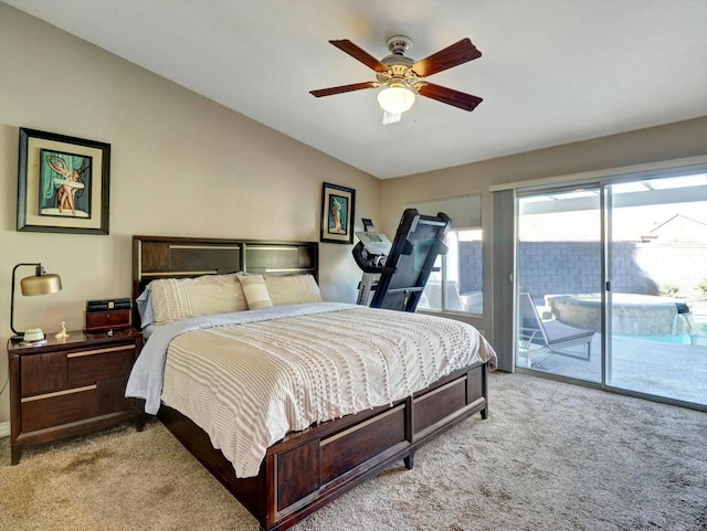 carpeted bedroom featuring ceiling fan, lofted ceiling, and access to exterior