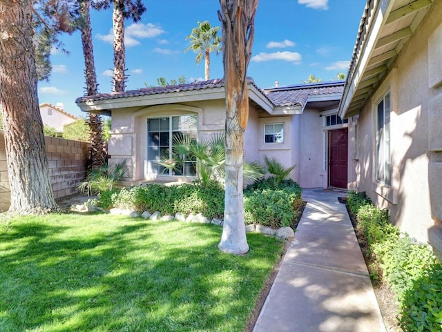 view of front of home with a front yard