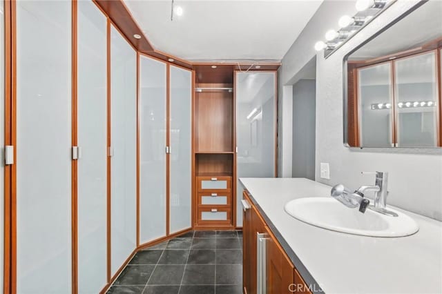 bathroom featuring tile patterned floors and vanity