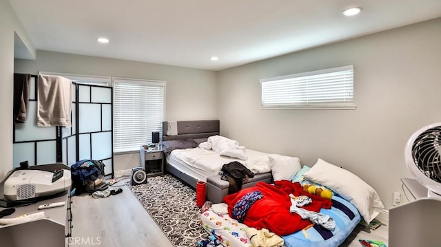 bedroom featuring hardwood / wood-style floors