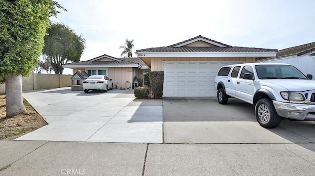 ranch-style home featuring a garage