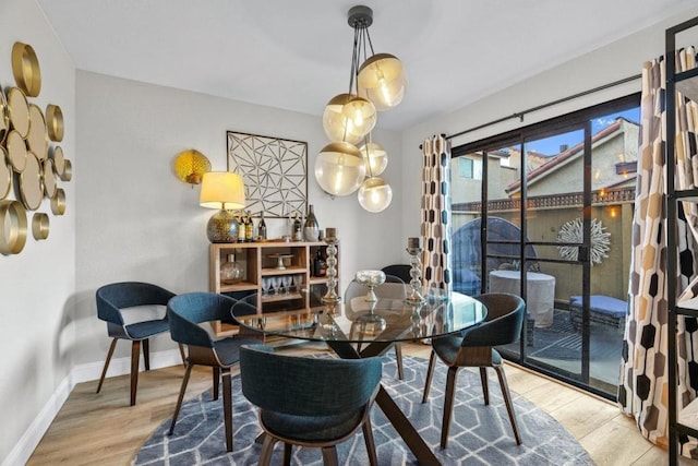 dining room featuring light wood-type flooring