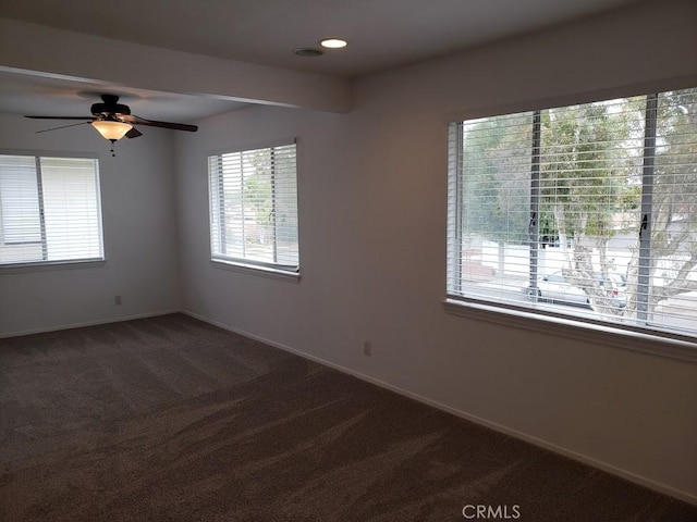 carpeted empty room with ceiling fan