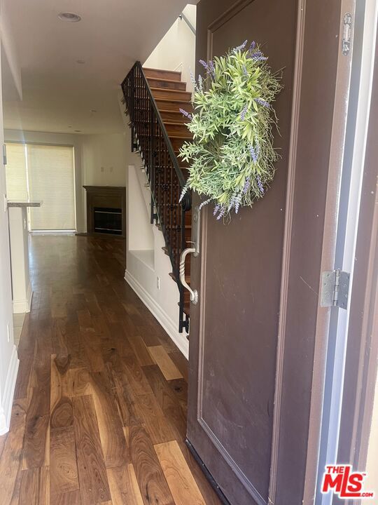 interior space with hardwood / wood-style floors