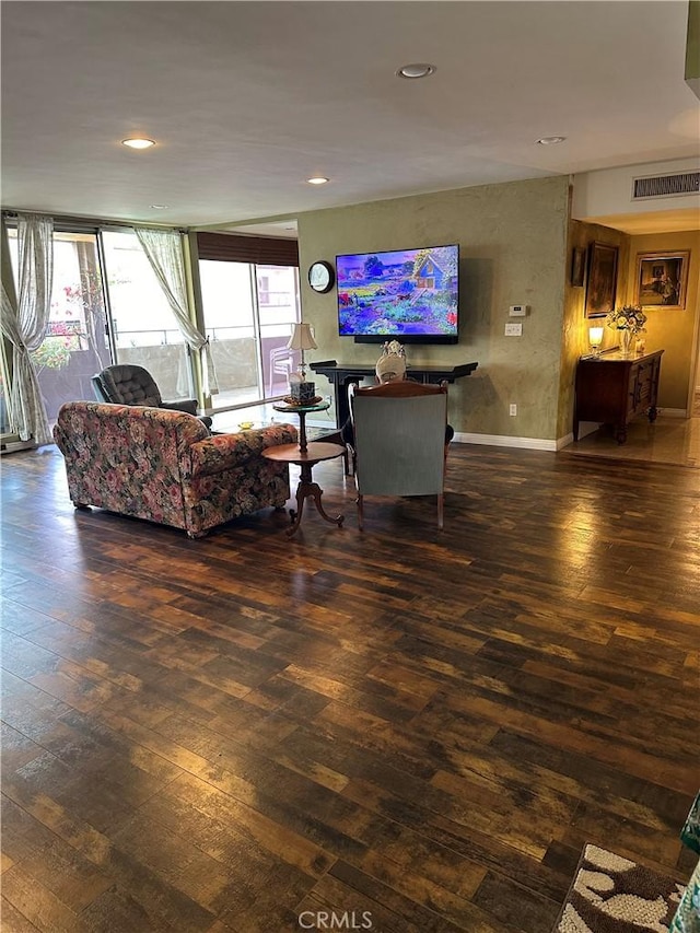 living room featuring dark hardwood / wood-style floors