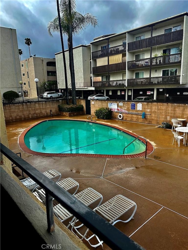 view of pool with a patio area