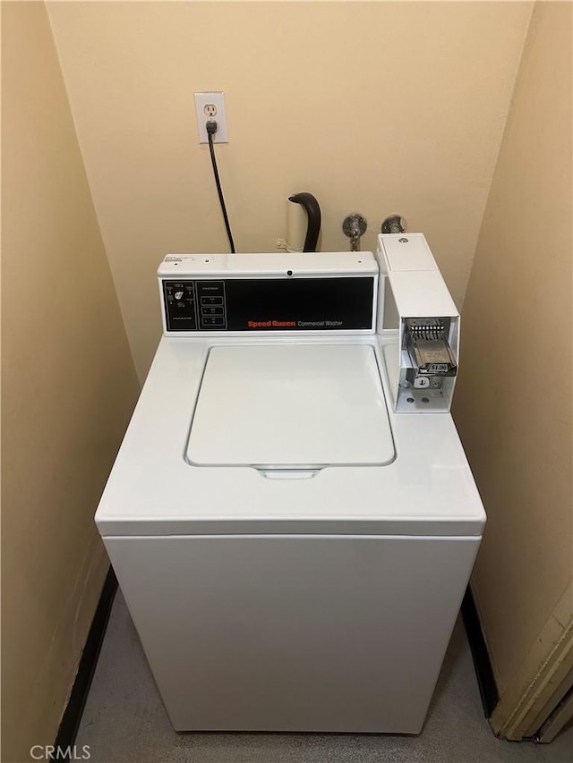 clothes washing area featuring washer / clothes dryer