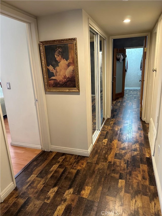 hall featuring dark hardwood / wood-style floors