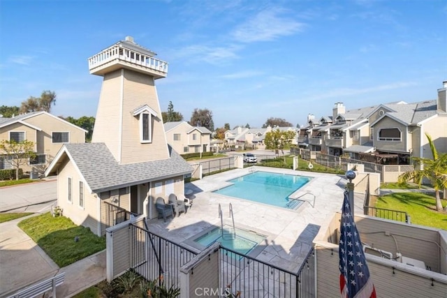 view of swimming pool featuring a patio area