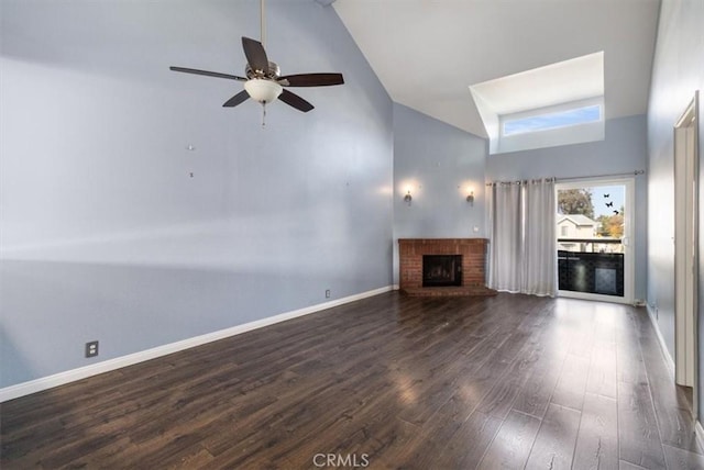 unfurnished living room featuring high vaulted ceiling, ceiling fan, a fireplace, and dark wood-type flooring