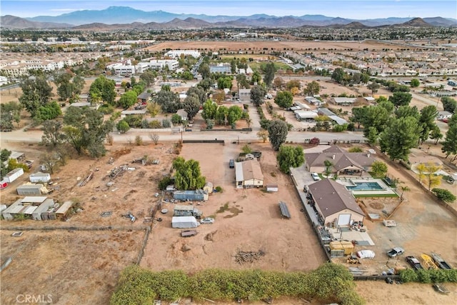 drone / aerial view featuring a mountain view