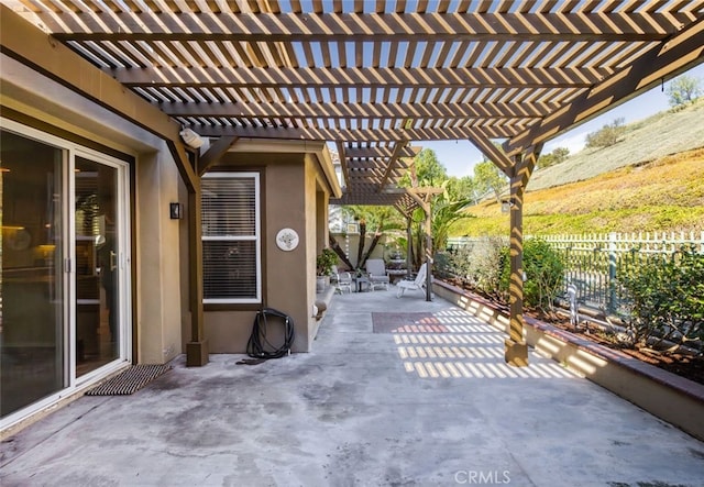 view of patio / terrace featuring a pergola