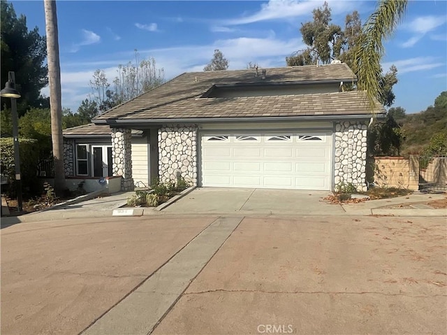 view of front of home featuring a garage