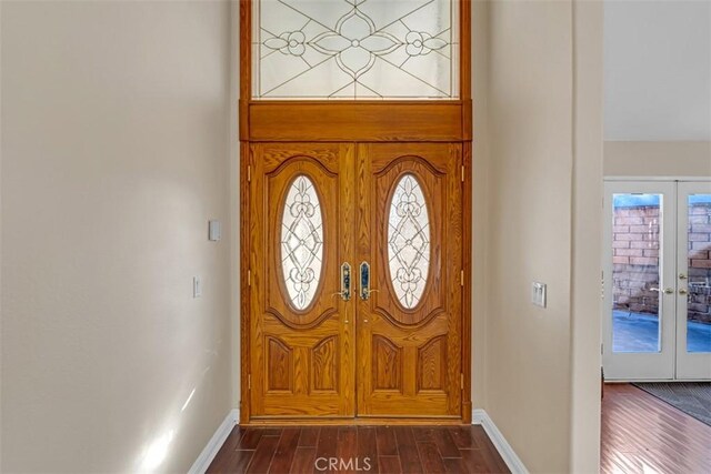 entrance foyer featuring plenty of natural light and french doors