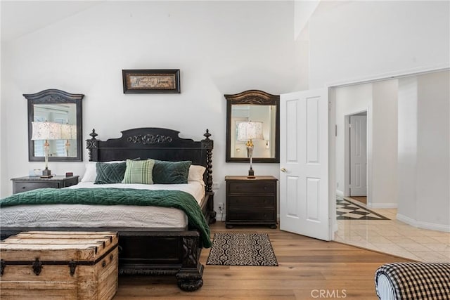 bedroom with hardwood / wood-style flooring