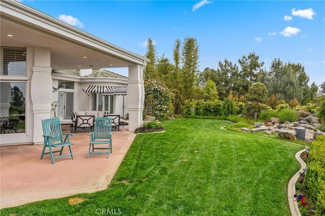 view of yard featuring a patio