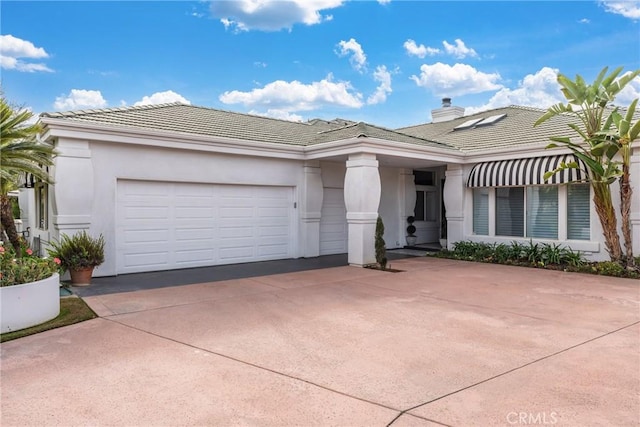 view of front of property featuring a garage