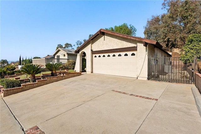 single story home featuring a garage