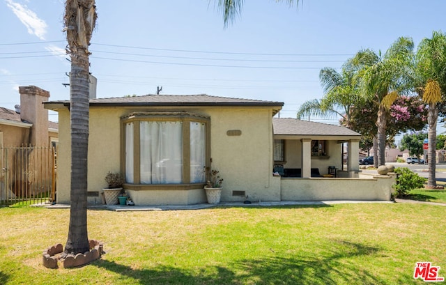 exterior space featuring a front yard