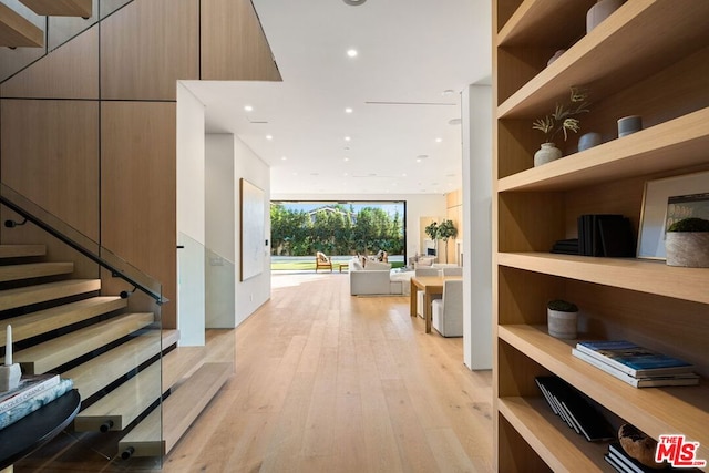 corridor featuring light hardwood / wood-style floors