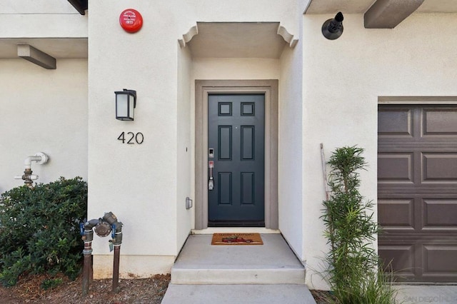 property entrance featuring a garage