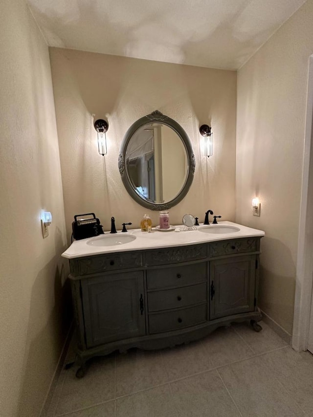 bathroom with vanity and tile patterned flooring