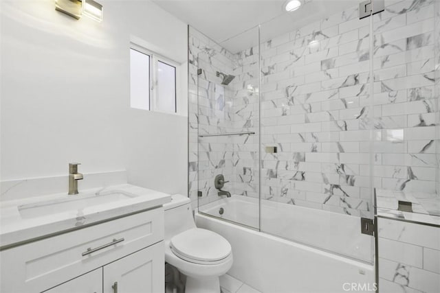 full bathroom with vanity, toilet, and enclosed tub / shower combo