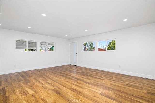 unfurnished room featuring light wood-type flooring