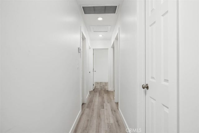 corridor featuring light hardwood / wood-style flooring