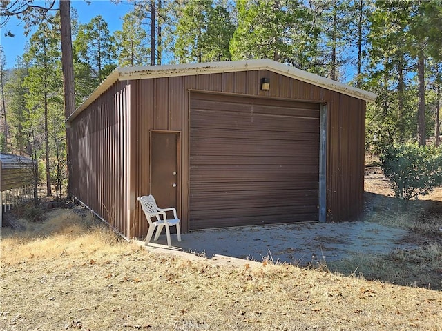 view of outbuilding featuring a garage