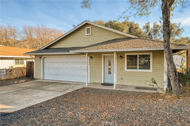 single story home with a garage