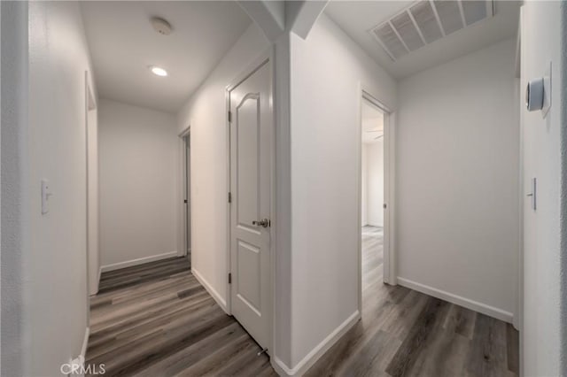 hall featuring dark wood-type flooring