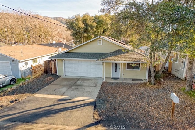 view of front of house with covered porch and a garage