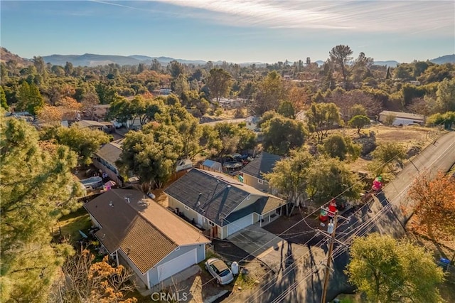 drone / aerial view featuring a mountain view