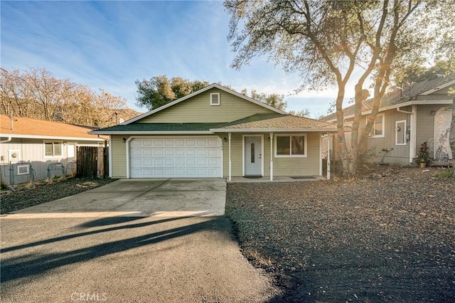 view of front of house featuring a porch and a garage