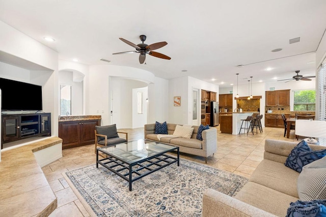 living room with ceiling fan