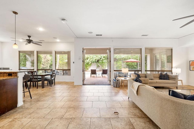 living room featuring ceiling fan