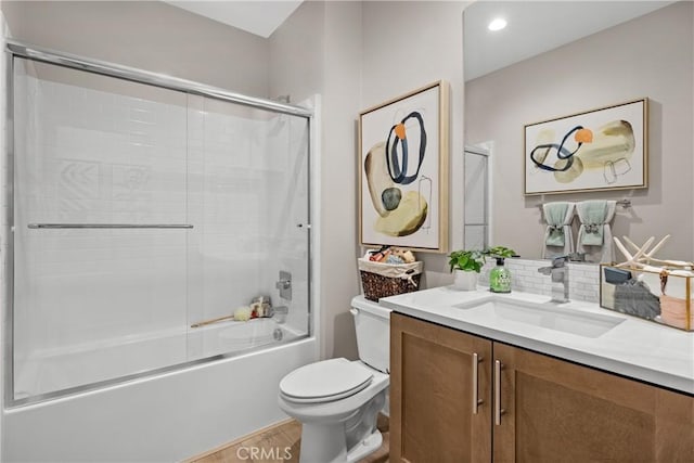 full bathroom with vanity, toilet, enclosed tub / shower combo, and wood-type flooring