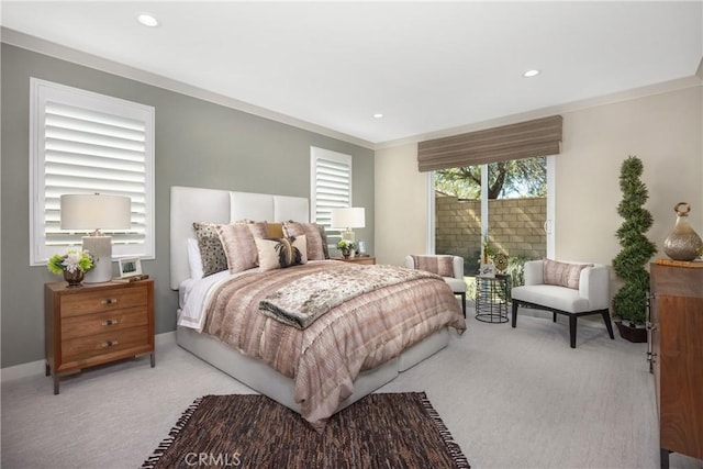 carpeted bedroom with ornamental molding