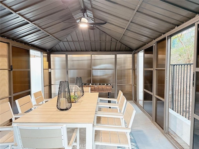 sunroom featuring ceiling fan and lofted ceiling