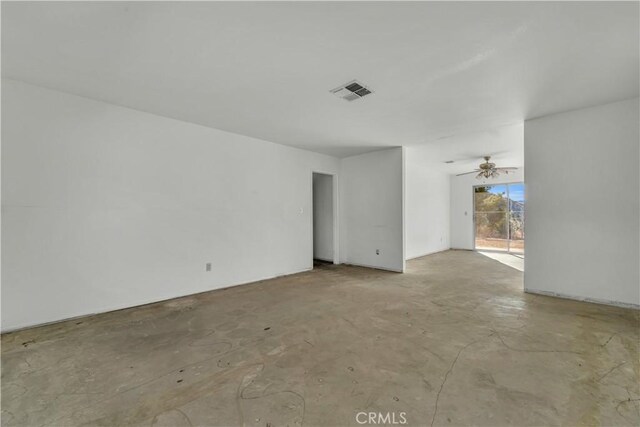 unfurnished room with ceiling fan