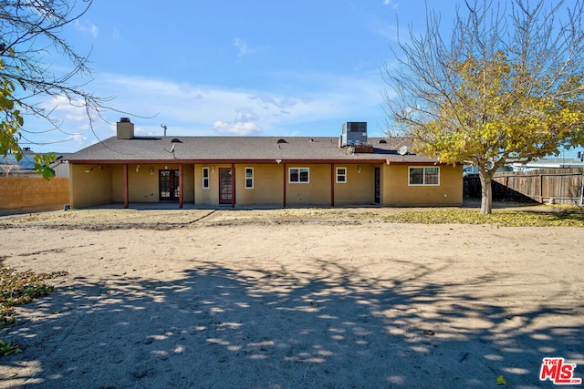 rear view of house featuring a patio area