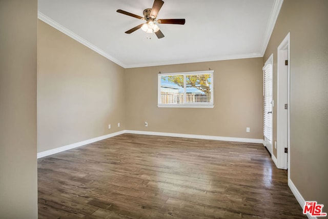 empty room with dark hardwood / wood-style floors, ceiling fan, and ornamental molding