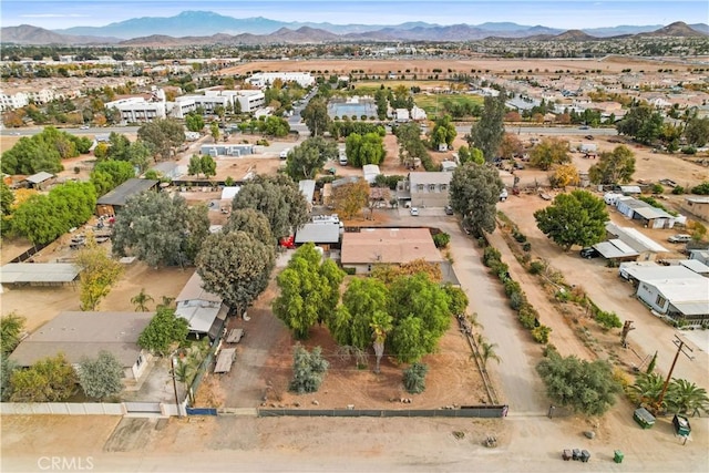 drone / aerial view featuring a mountain view