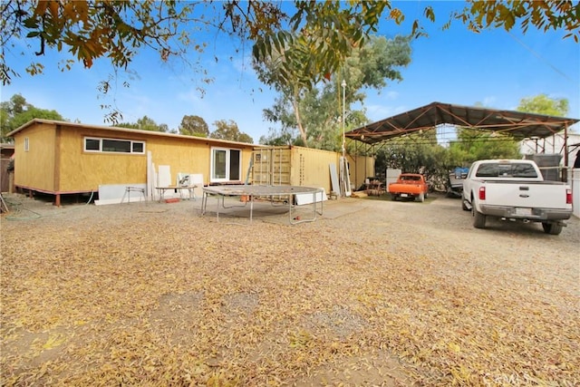 view of front of property featuring a trampoline