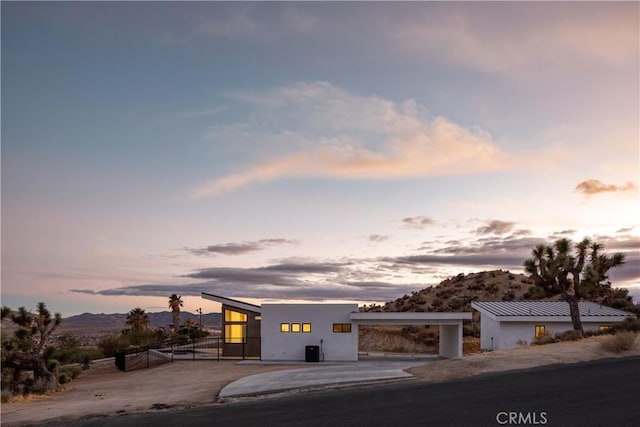 view of front of home with a mountain view