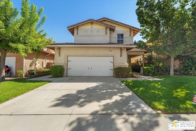 view of front of property featuring a front lawn and a garage