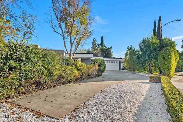 view of front of house featuring driveway and an attached garage